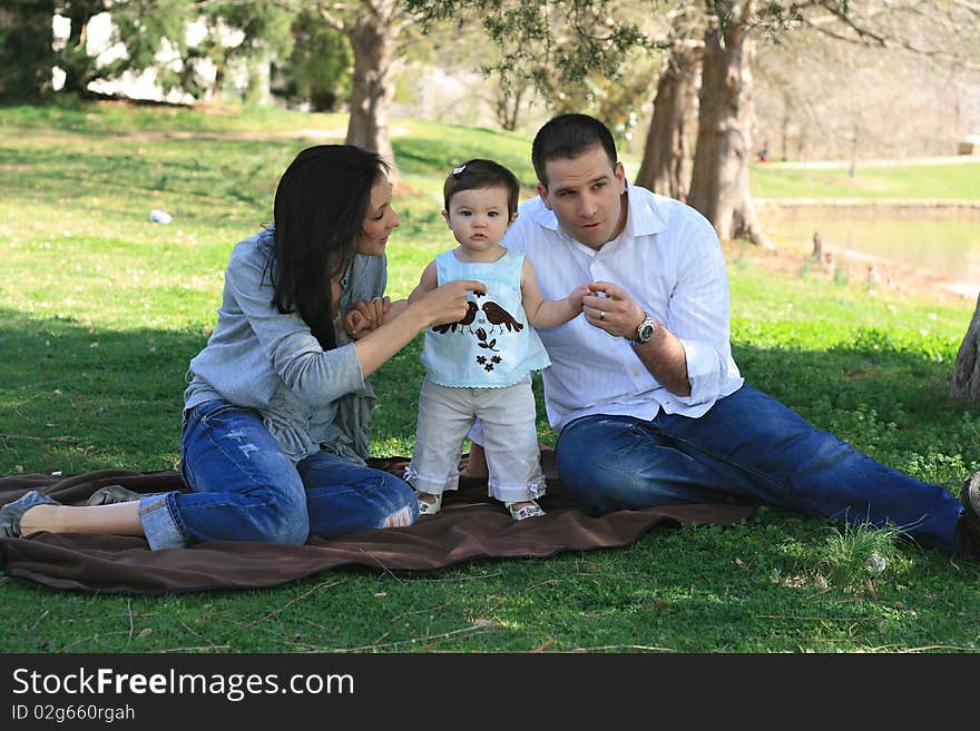 Beautiful family enjoying the park. Beautiful family enjoying the park