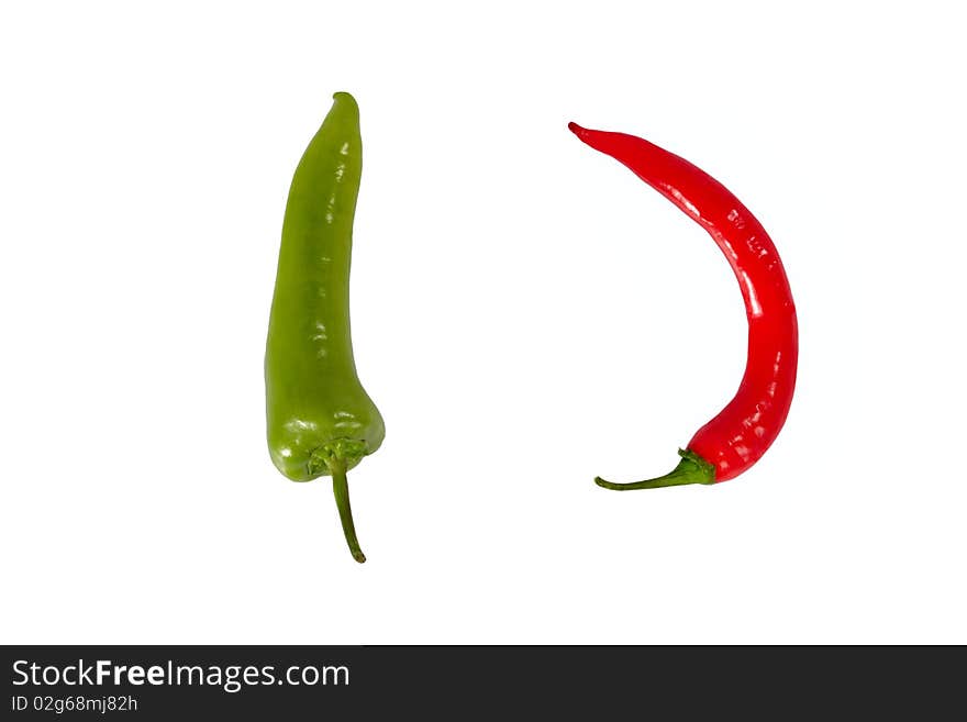 Red and green chili pepper on white background