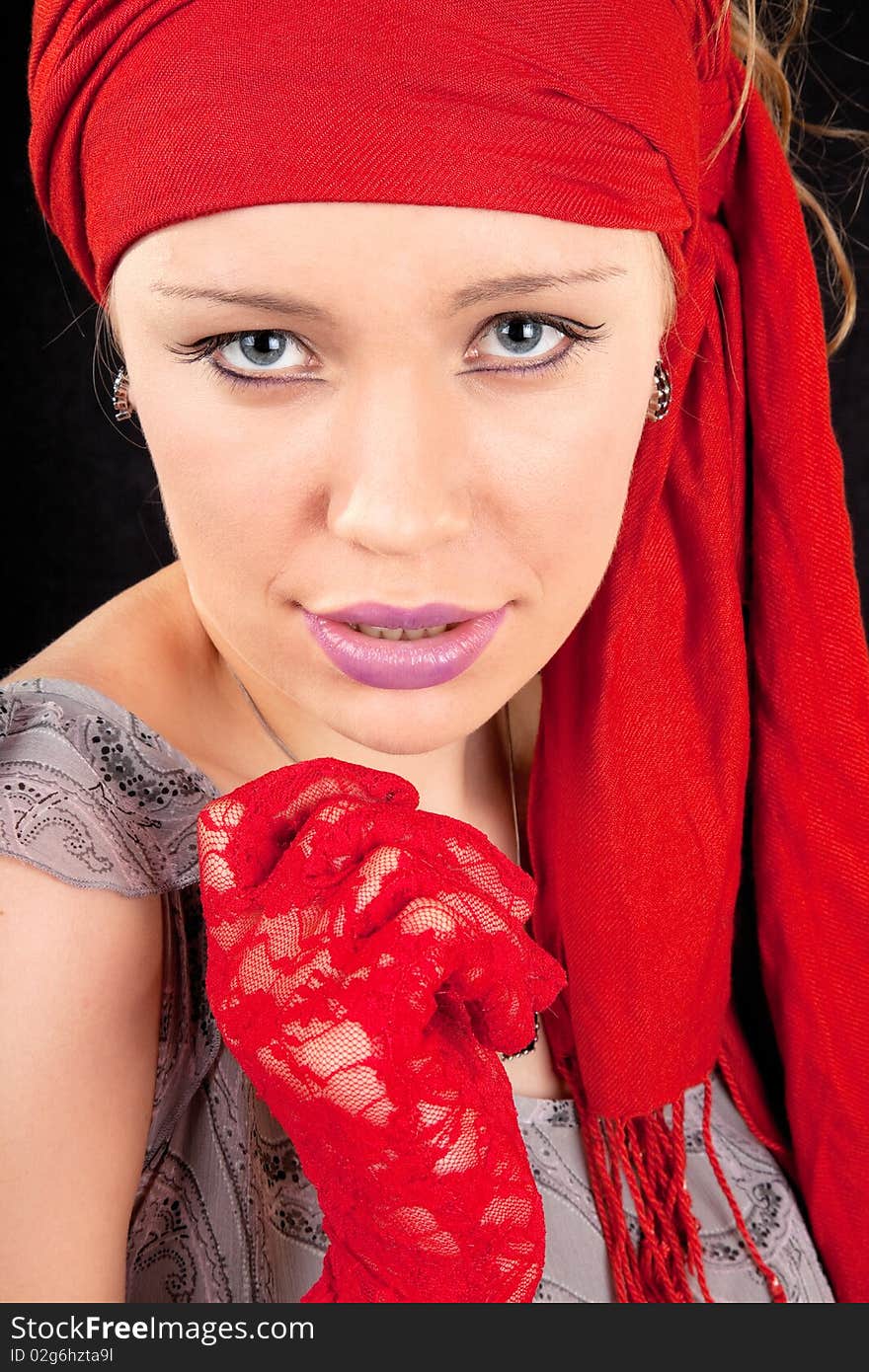 Portrait of a young girl in red color. Portrait of a young girl in red color