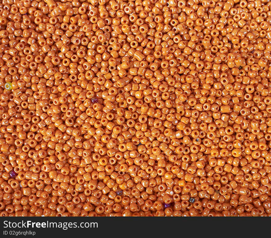 Colorful fake beads background, orange