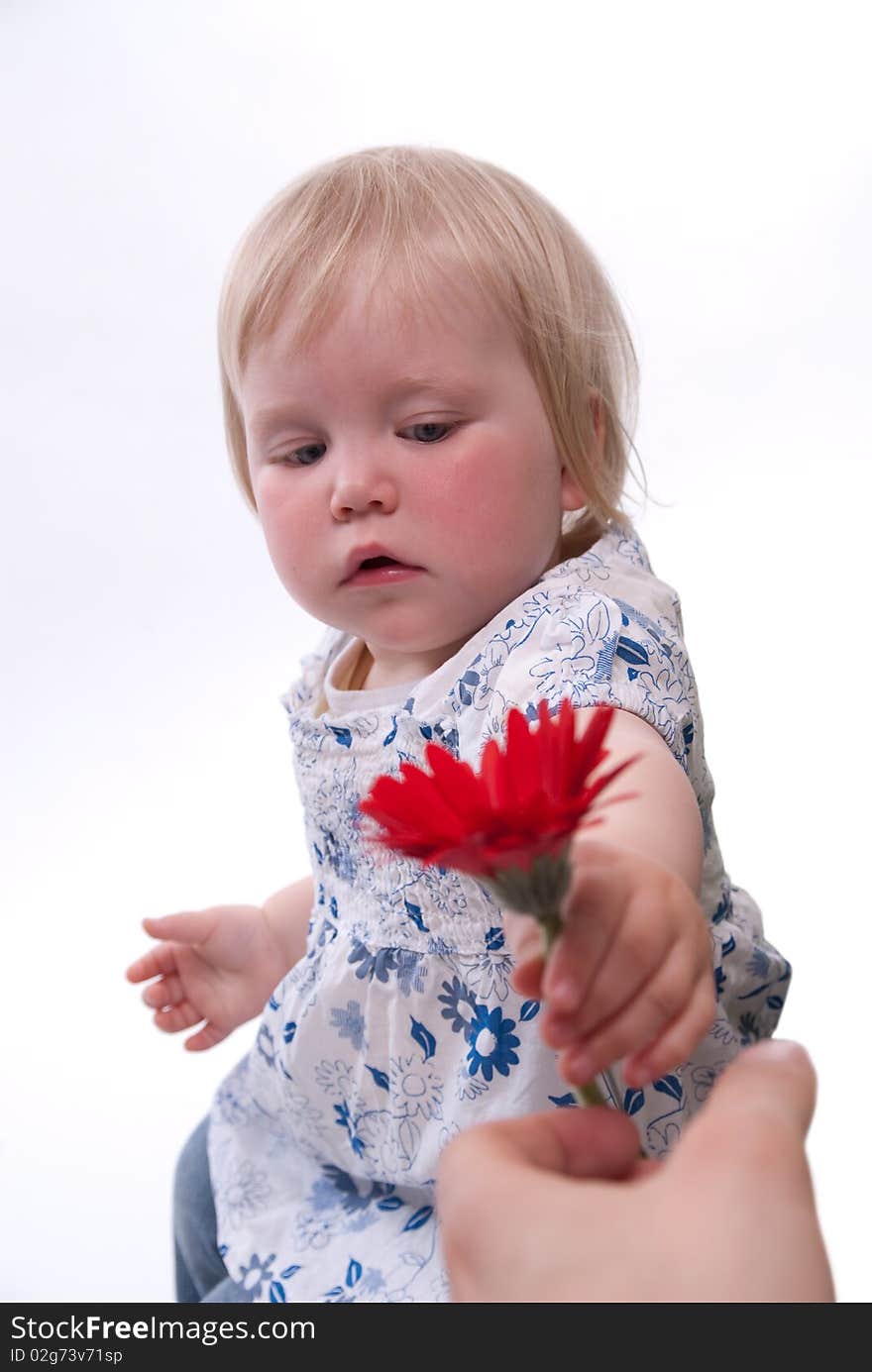 Child gives her mother flowers for Mothers Day. Child gives her mother flowers for Mothers Day