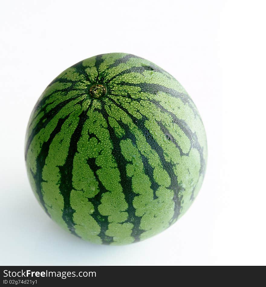 A melon covered with drops