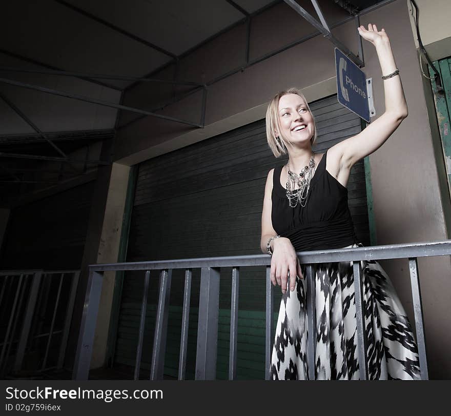 Woman Waving And Smiling