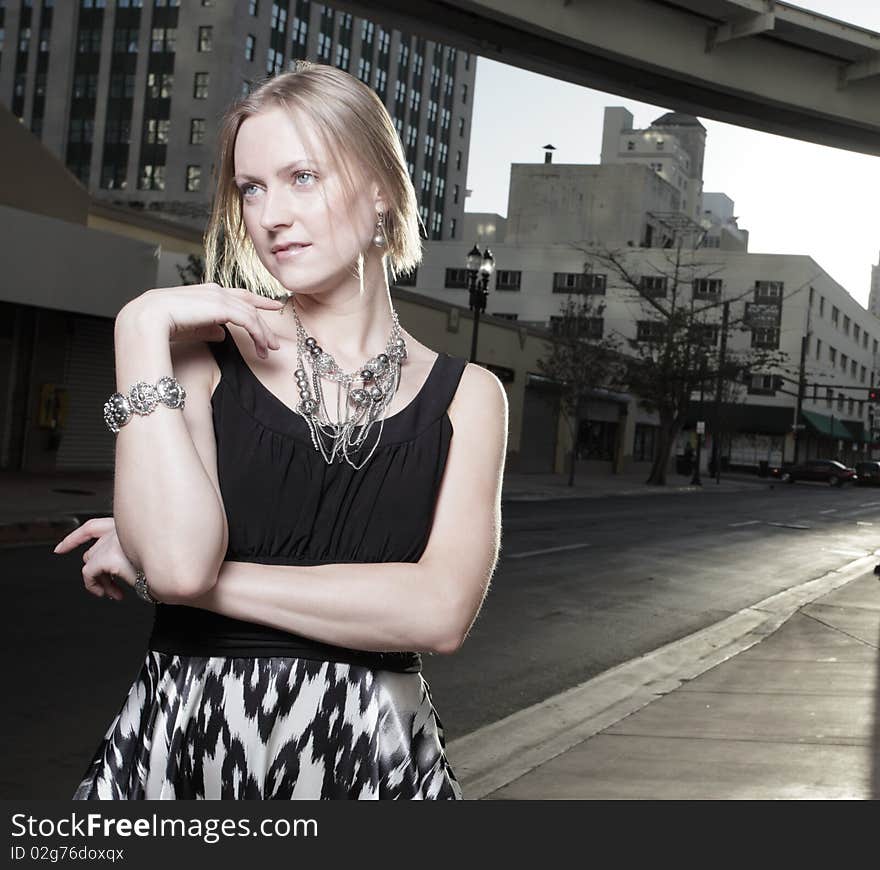 Attractive young woman smiling and glancing away