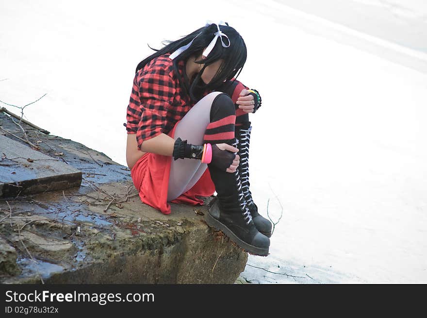 Girl in the red on the edge