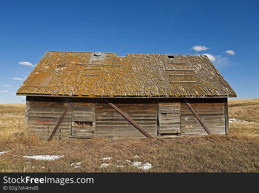 Old shack in field