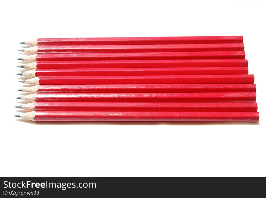 Close up of red pencil with white background