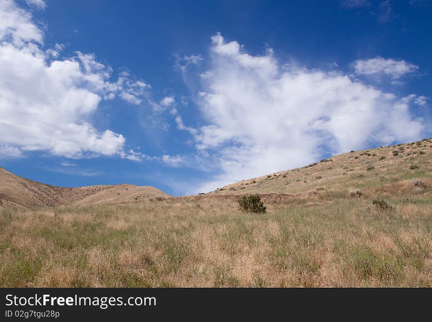 Hills against the cloudy sky