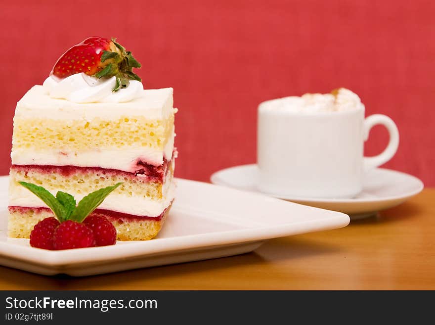 Strawberry cake with cappuccino