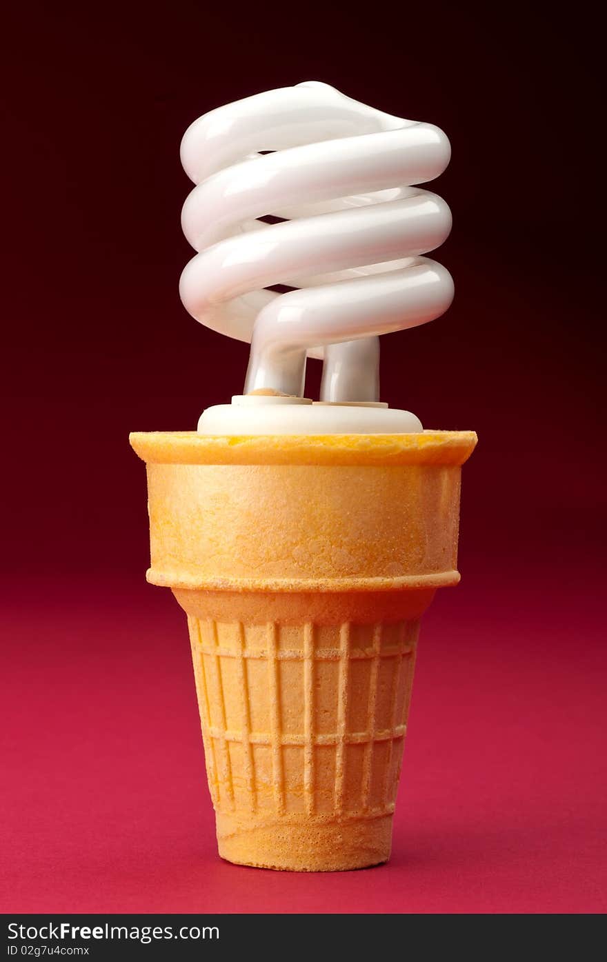 A compact fluorescent bulb in an ice cream cone