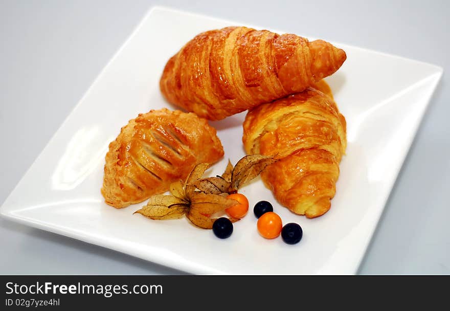 A bread image on the plate and white background