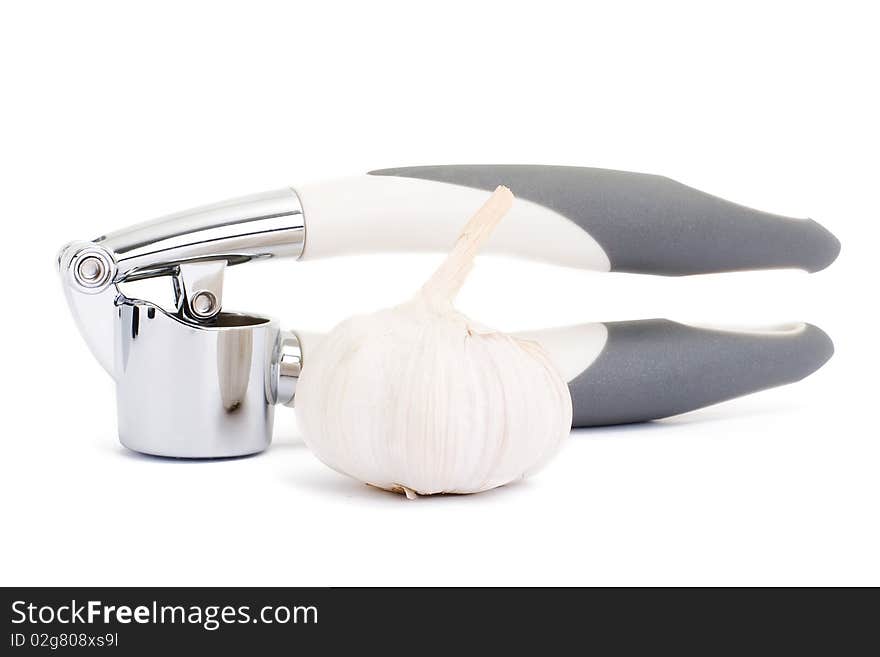 Garlic press isolated on white