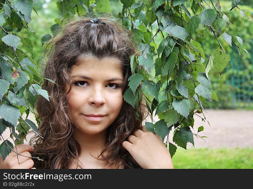 Beautiful girl with green leaves. Beautiful girl with green leaves