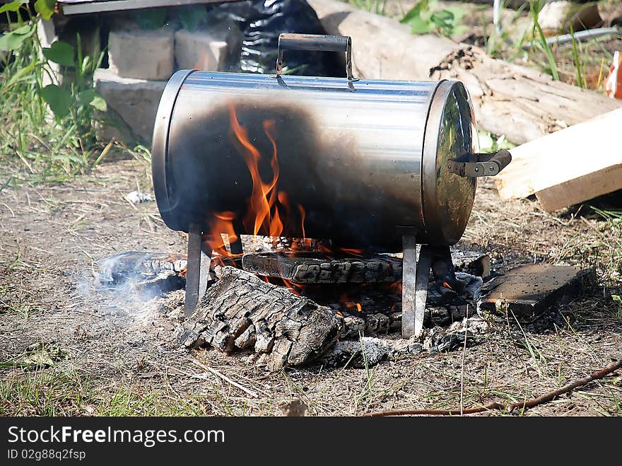 Cooking on a fire in the woods. Cooking on a fire in the woods