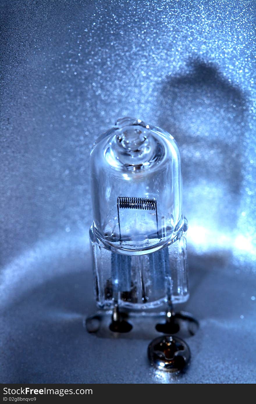 Extreme closeup of small modern halogen light bulb