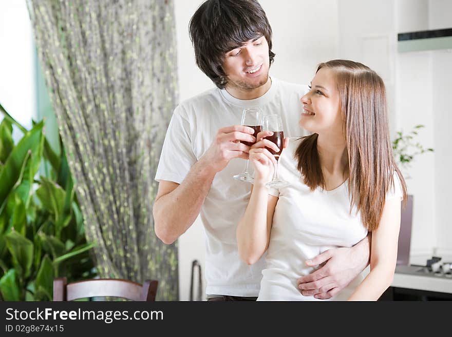 Beautiful girl with smile and boy with wineglasses. Beautiful girl with smile and boy with wineglasses