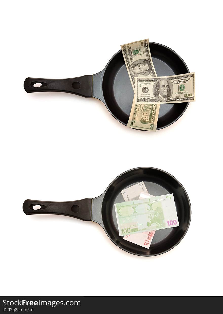 Two  frying pans with dollar and euro bills