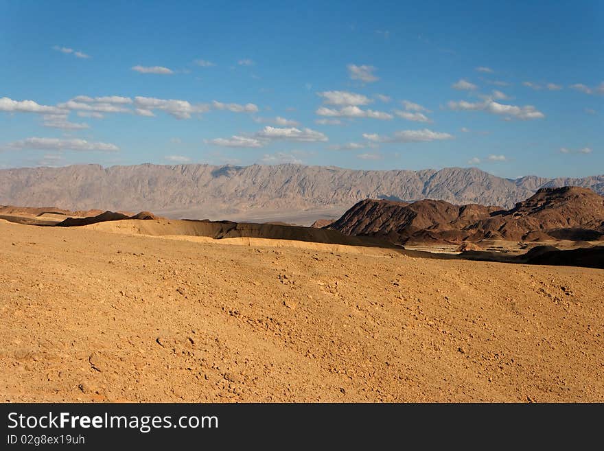 Rocky desert landscape at sunset