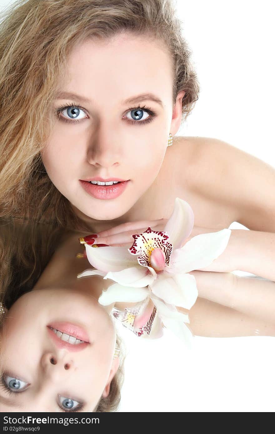 Young beautiful woman over white