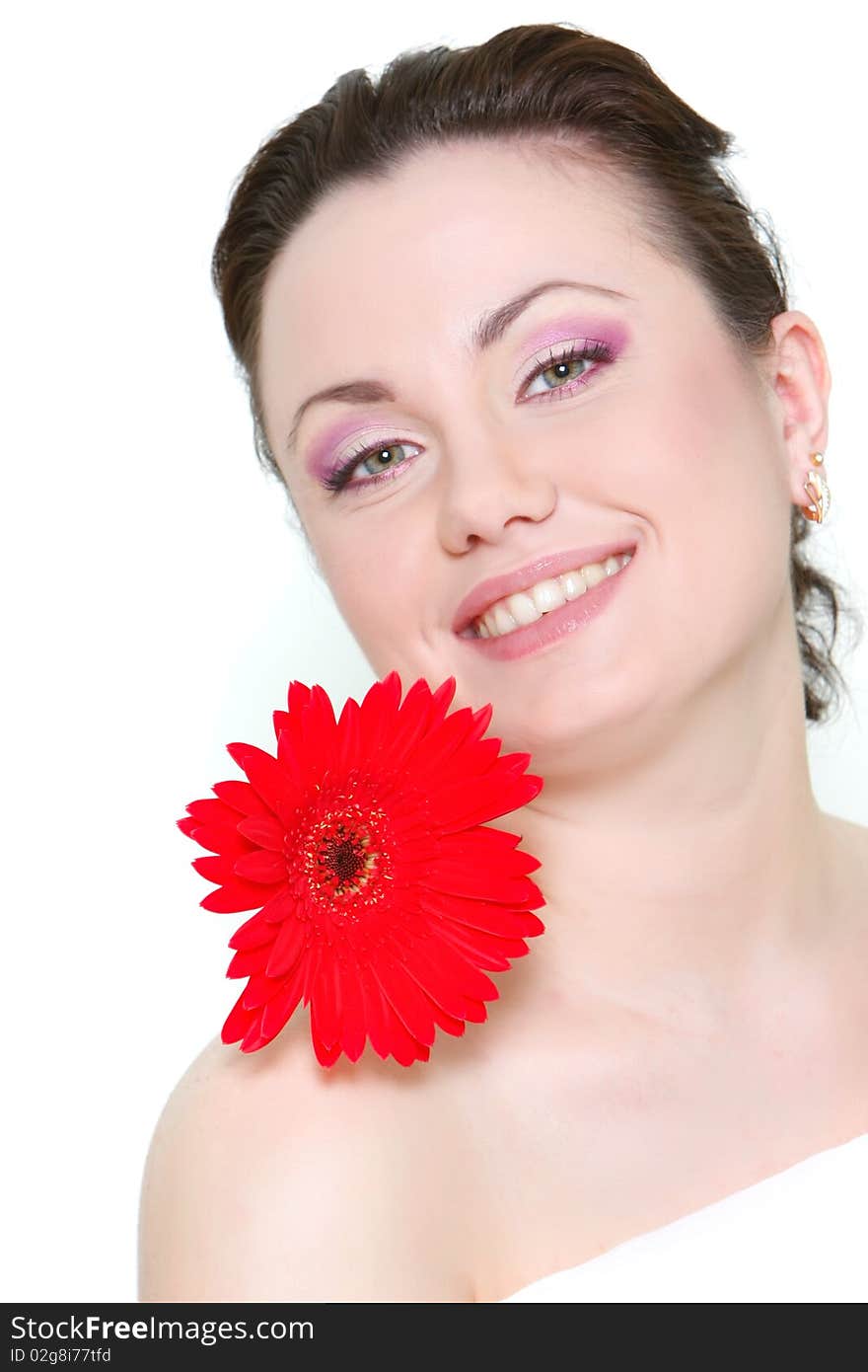 Attractive woman with red flower