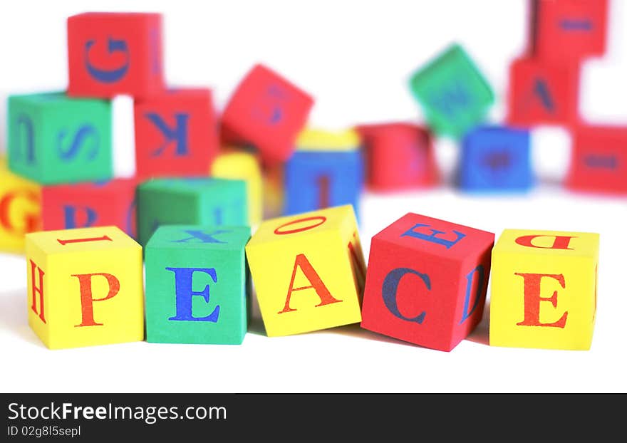 Children's building blocks spelling the word peace