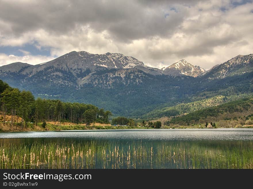 Lake Doksa with snow montains at Feneo Korinthia Hellas. Lake Doksa with snow montains at Feneo Korinthia Hellas