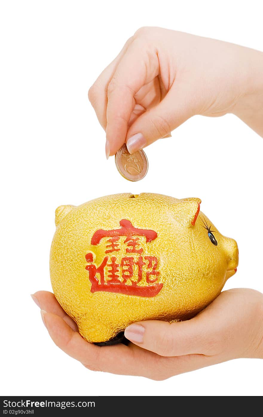 Piggy bank and hand with coin isolated over white