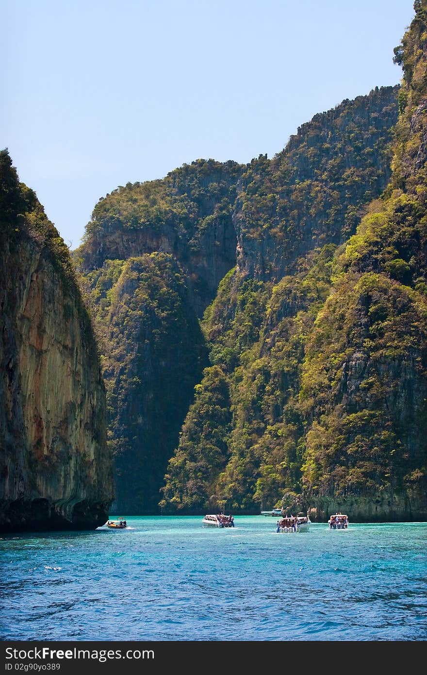 Green cliffs in the sea