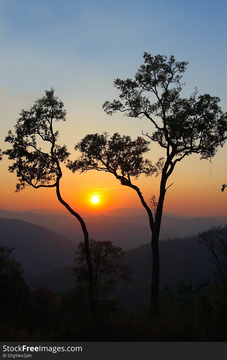 Sunset In Mountains