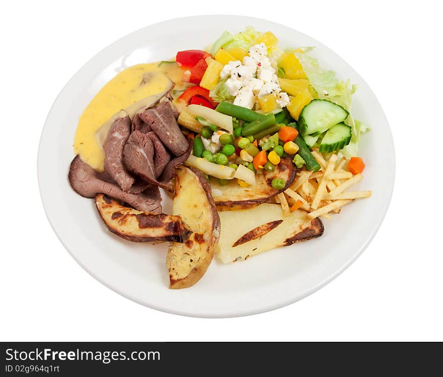 Roast beef with salad, potatoes and bernaise sauce isolated on white. Roast beef with salad, potatoes and bernaise sauce isolated on white.