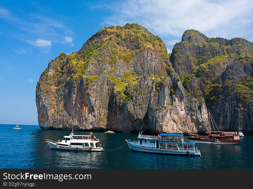 Green cliffs in the sea