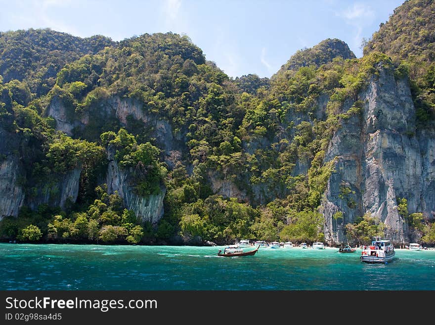 Green cliffs in the sea