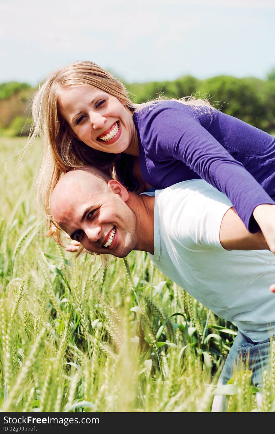 Embracing lovely lovers having fun in the park