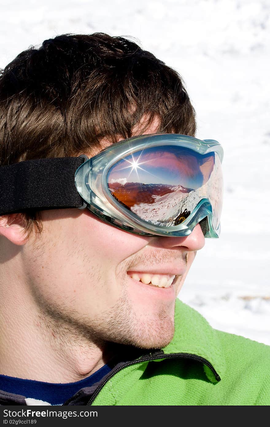 Hiker boy in winter mountains