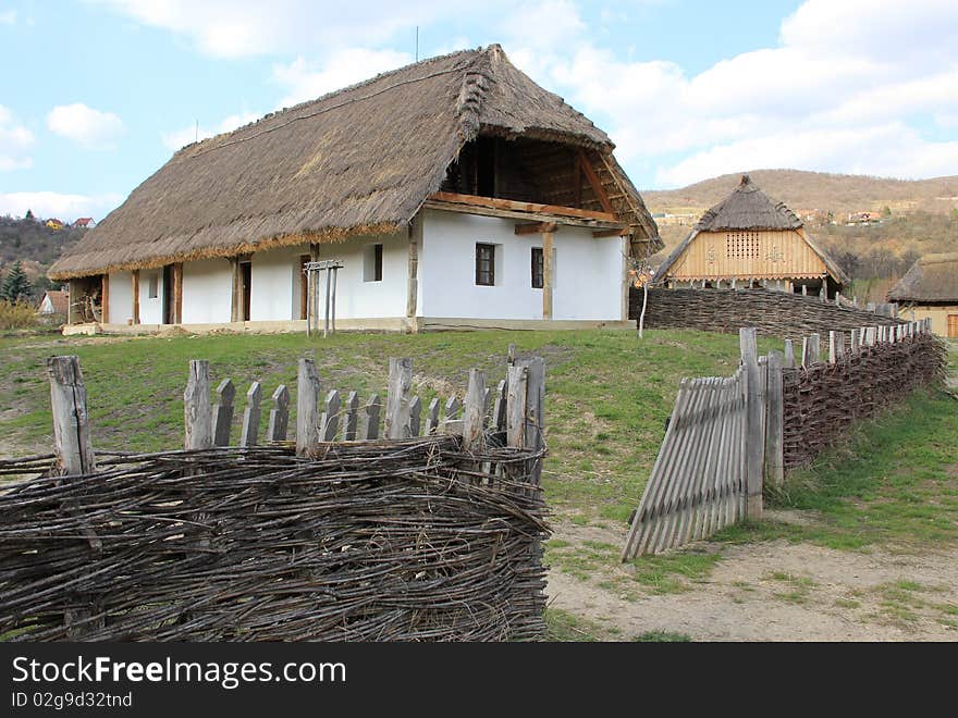 A country house and fence.