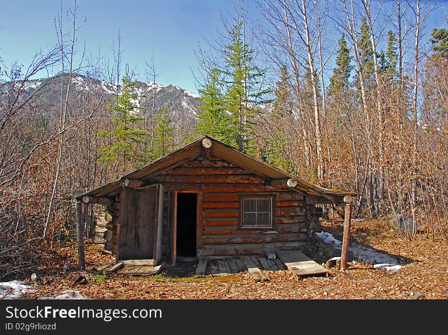 Log cabin in Alaska in Autumn