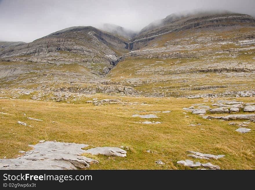 Pattern wall in mountain - Ordesa National Park - Spain. Autumn rainy day. Pattern wall in mountain - Ordesa National Park - Spain. Autumn rainy day.