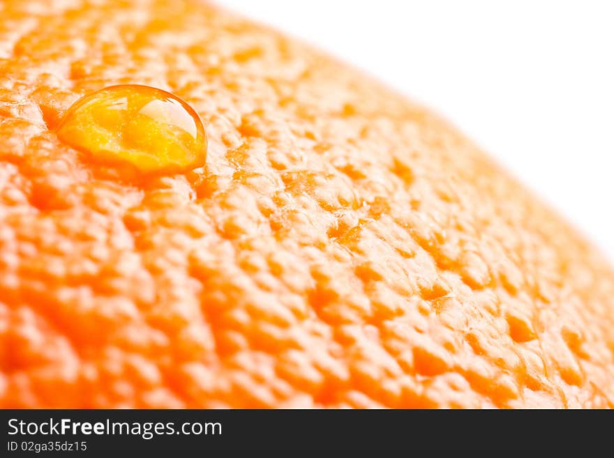 Water drop on the ripe orange, macro closeup photo. Water drop on the ripe orange, macro closeup photo