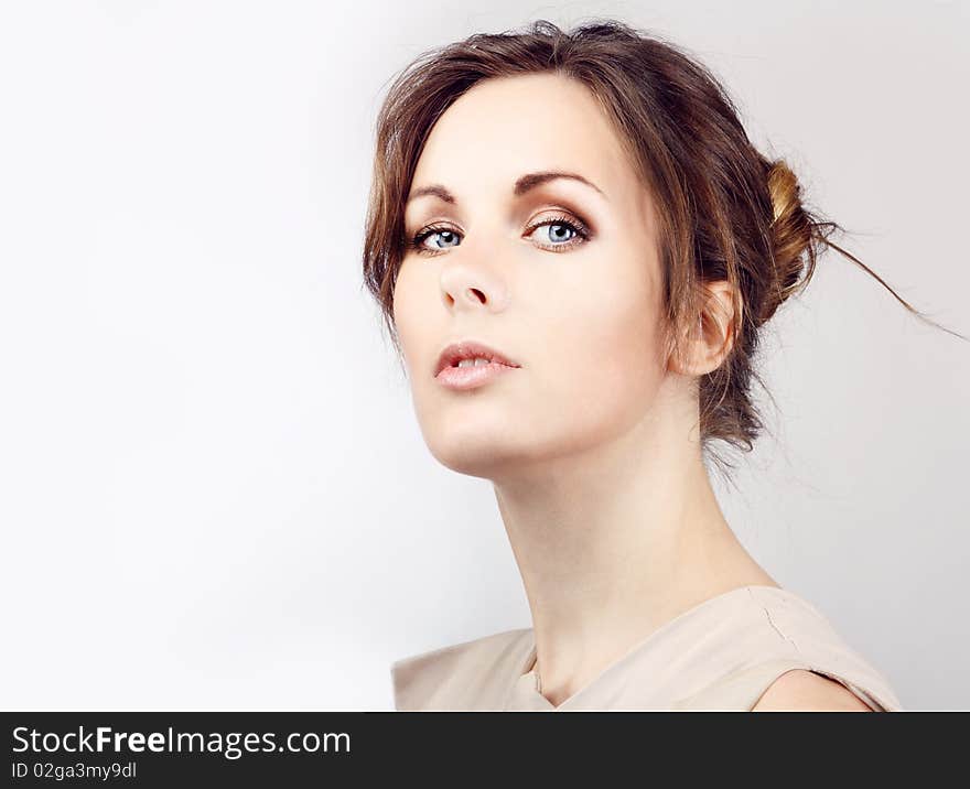 Close-up portrait of caucasian young woman with beautiful blue eyes. Close-up portrait of caucasian young woman with beautiful blue eyes