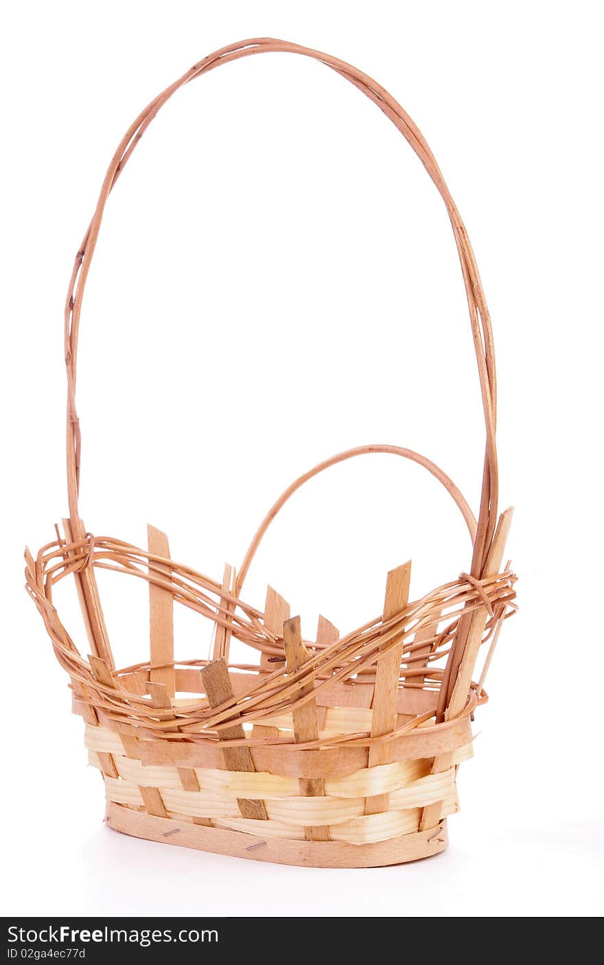 Empty Natural Wicker Handled Basket with white background