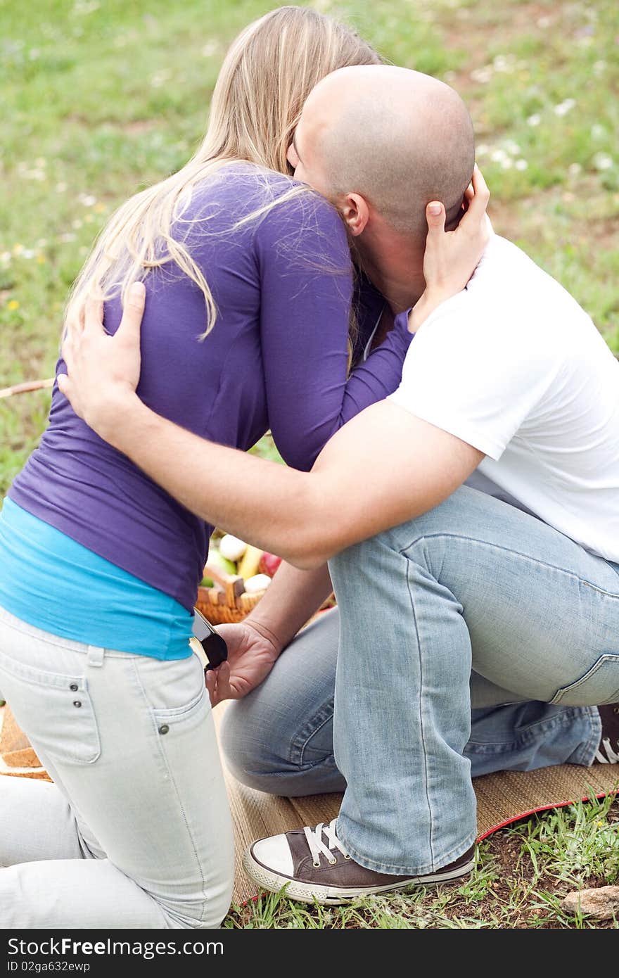 Young couple making fun in the park