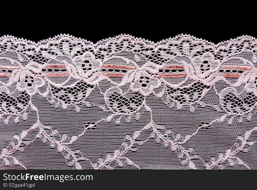 Rose lace with pattern in form flower insulated on black background