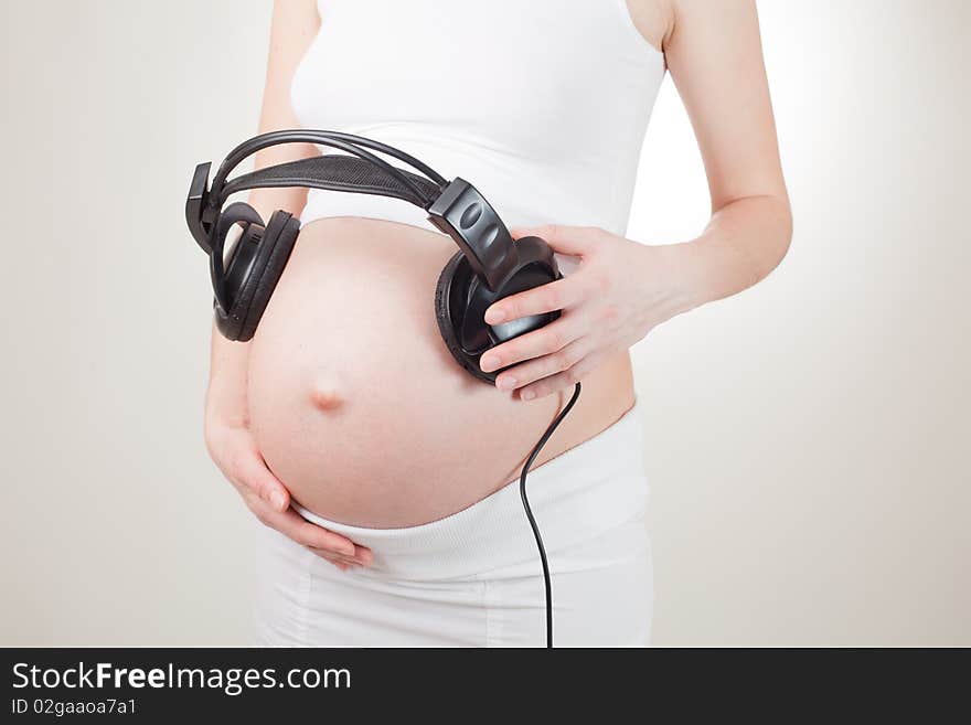 Earphones for pregnant belly