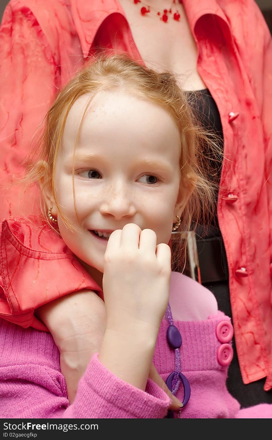 Happy little girl with curiosity looks