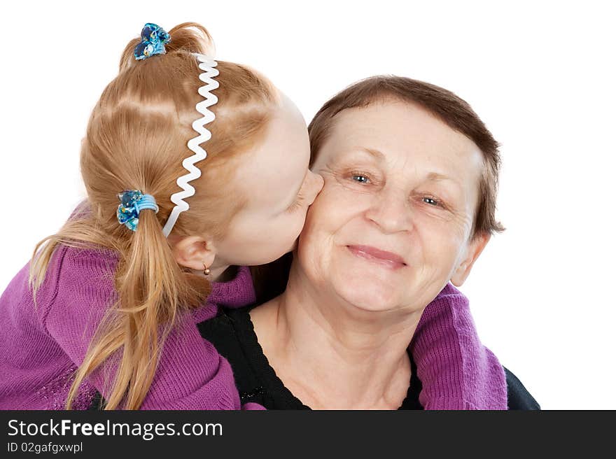 Happy grandma and granddaughter isolated on white. Happy grandma and granddaughter isolated on white