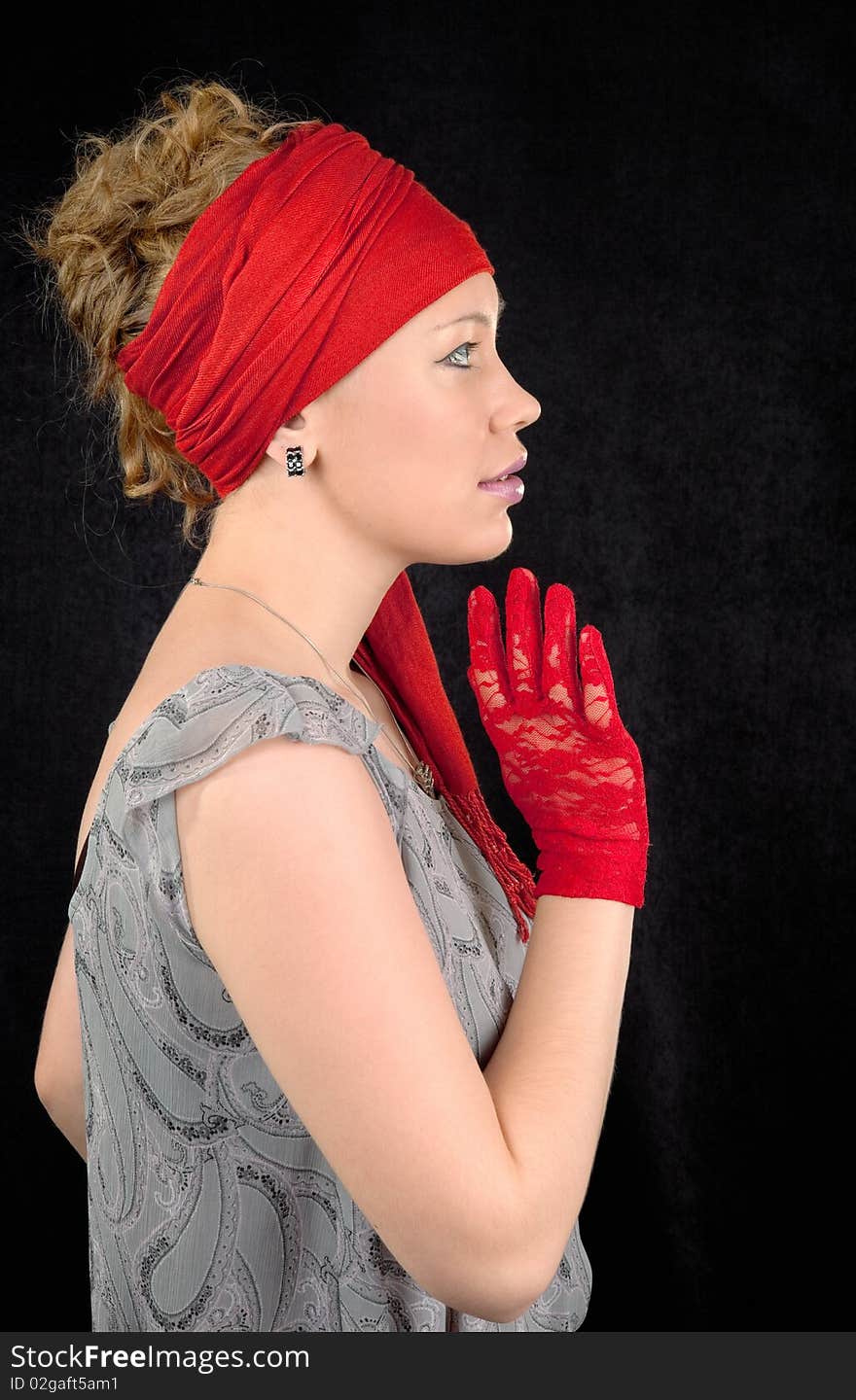 Portrait of a young girl in red color. Portrait of a young girl in red color