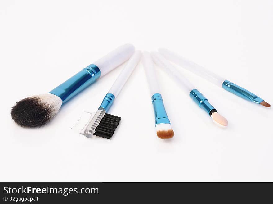 Brushes for cosmetics on a white background. Brushes for cosmetics on a white background