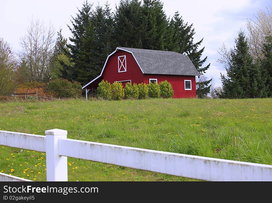 A red barn in a country.