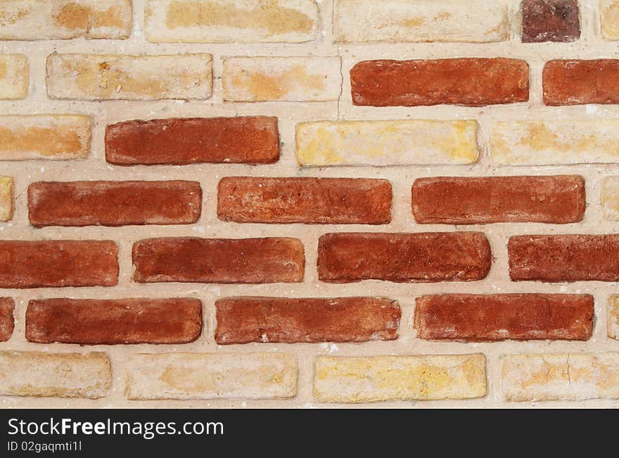 Interior white and red brick wall