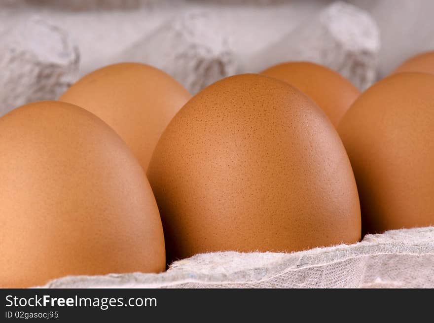 Brown eggs in packing for eggs. Brown eggs in packing for eggs